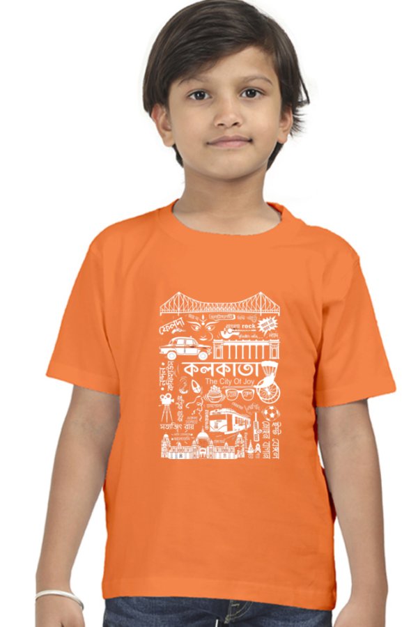 a boy in an orange shirt