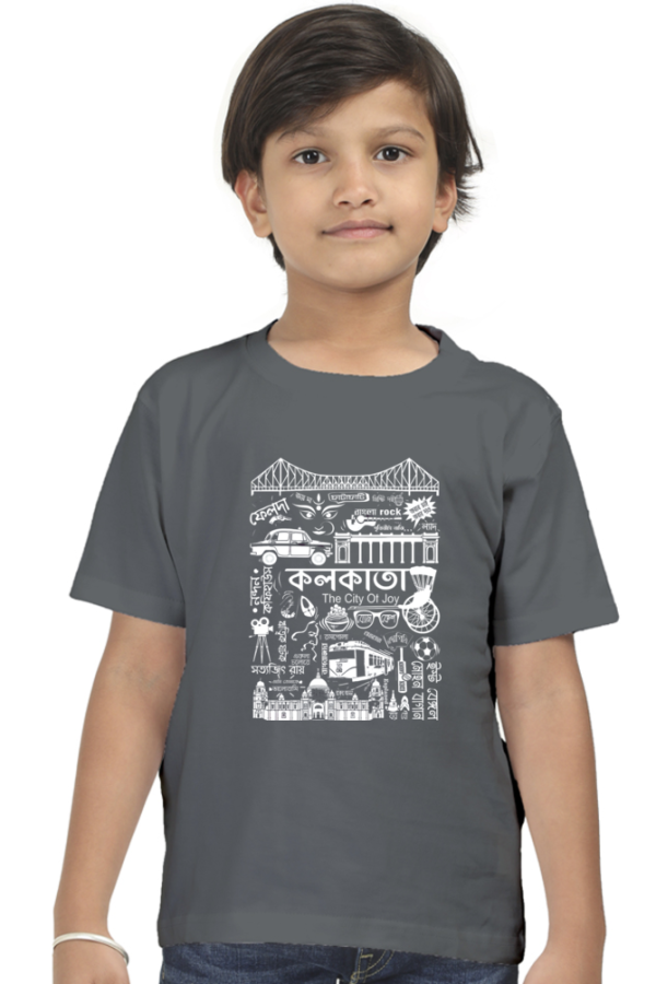 a boy wearing a grey shirt