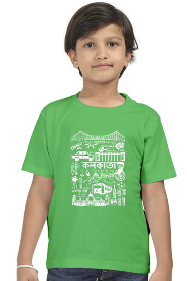 a boy in a green shirt