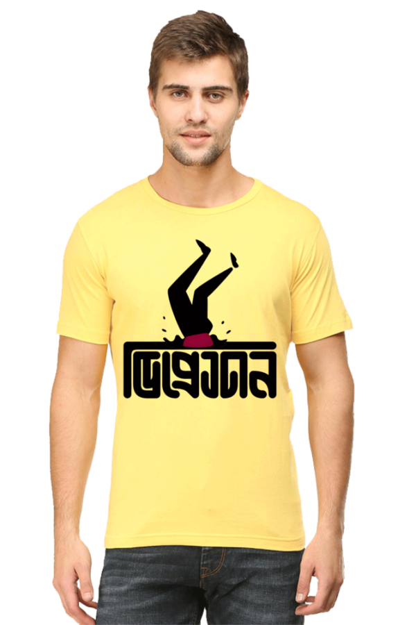 a man wearing a yellow shirt